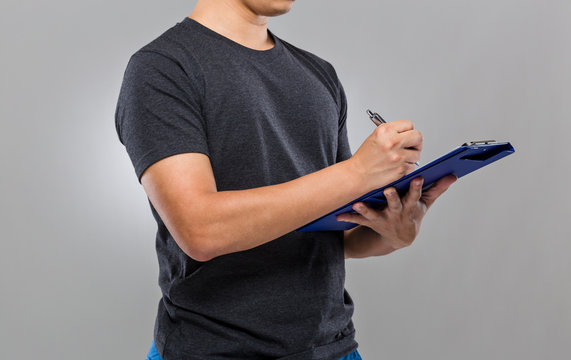 Man write on clipboard