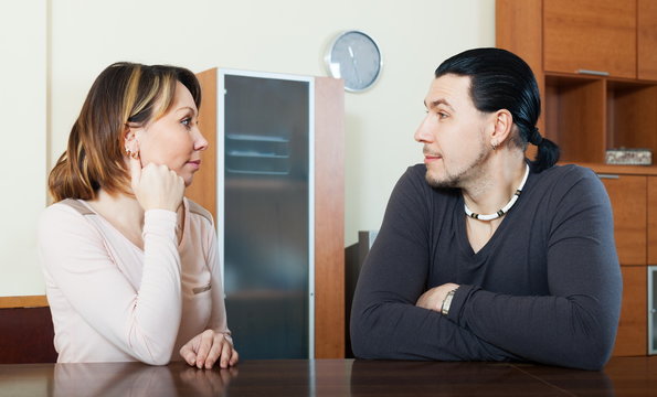 Ordinary couple talking at home