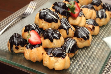 Eclair with hot chocolate