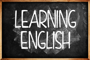 Obraz premium Learning English title on Language School Blackboard