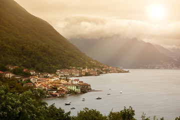 View of italian village on Como lake in sunlight