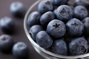 Fresh blueberries in a glass bowl