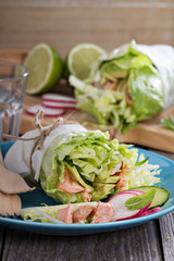 Salad with poached salmon and vegetables