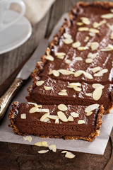 Vegan chocolate tart with almonds