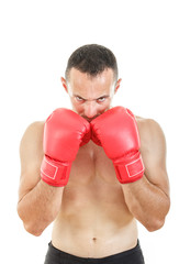 muscular man with connected red boxing gloves near his face