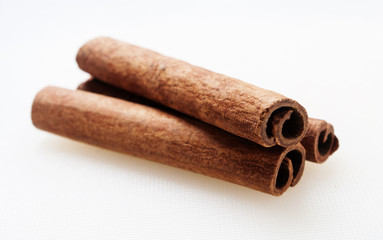 Cinnamon close up on white background
