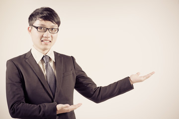 Successful young business man of Asian, full length portrait iso