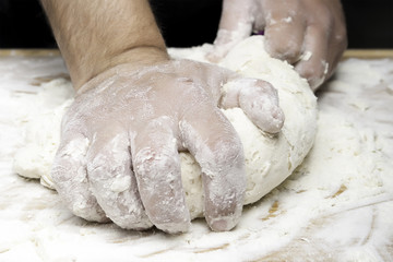 kneading bread with hands