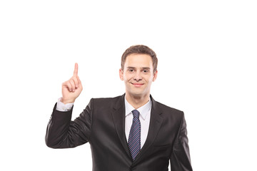 Young businessman pointing up with his finger
