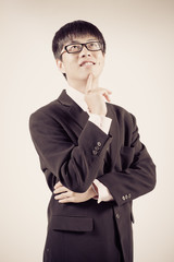 Successful young business man of Asian, full length portrait iso