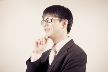 Successful young business man of Asian, full length portrait iso