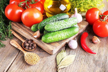 Fresh vegetables with herbs and spices on table, close-up