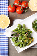 Salad with green beans and corn, and sauce
