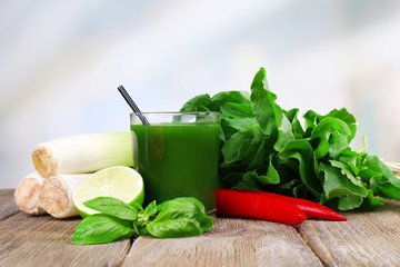 Fresh vegetable juice with spring onion, tuft of sorrel and