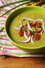 Leek soup on table, close up