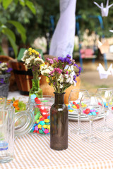 Buffet table with dishware waiting for guests