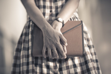 Portrait of smiling woman hold book