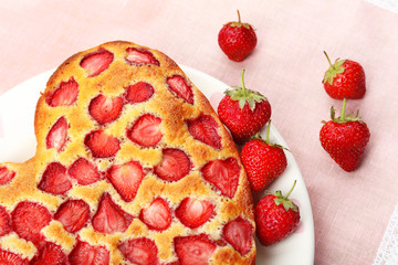 Tasty strawberry pie on table