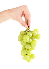 Green grape in hand isolated on white