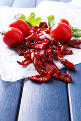 Sun dried and fresh tomatoes, basil leaves, garlic