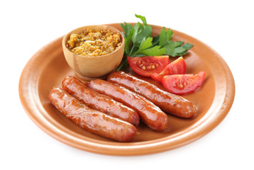 Tasty thin sausages on plate isolated on white