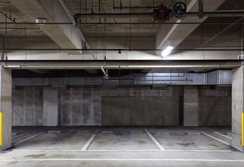 Parking garage underground interior, neon lights in dark
