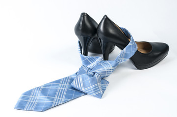 Black high heel show and neck tie