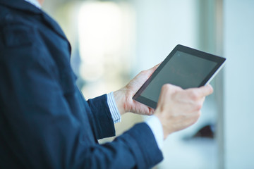 men holding digital tablet