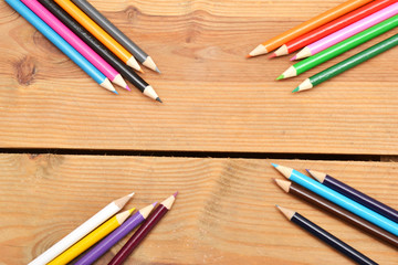 Obraz premium Colored pencils on wood