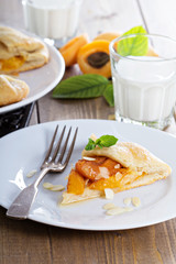 Open pie with apricots