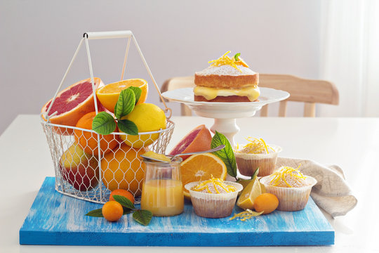 Citrus candy bar with fruits and cakes