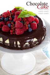 Cheesecake with berries on a brownie layer