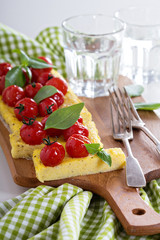 Polenta tart with baked tomatoes