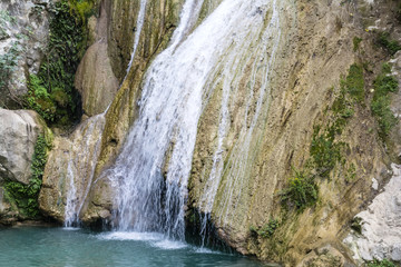 Fototapeta na wymiar Mountain Lake and Waterfall