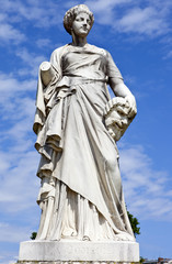 Naklejka premium La Comedie Statue in Jardin des Tuileries in Paris