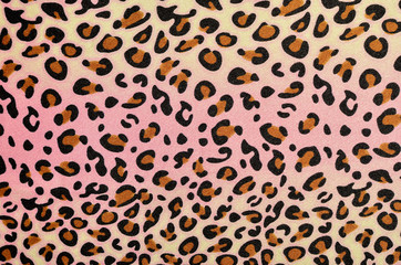 Brown leopard pattern on pink and yellow stripes.Animal print. - 69268407