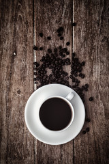 Black coffee on a wooden table
