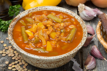 tomato soup with lentils and vegetables, top view