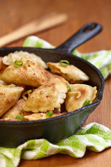 Dumplings fried with onion