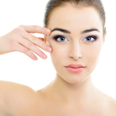 beautiful woman's face with accent on eyes, eye scanning technol