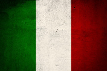 Italian flag printed on grunge concrete wall, national italian b