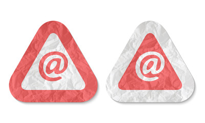 triangles with a texture of crumpled paper and email symbol