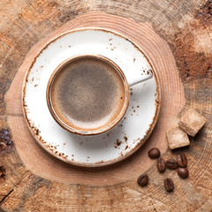 Coffee cup on wooden vintage  background