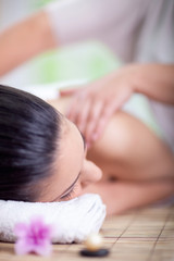 Beautiful woman having a wellness back massage