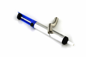syringe for suctioning the solder on a white background
