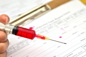 medical form and syringe