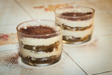 Traditional italian dessert tiramisu in a glass