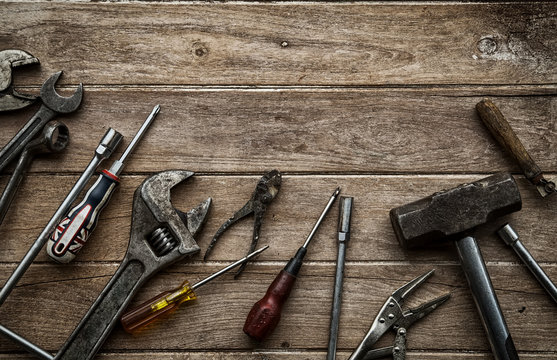 Old tools on a wooden table