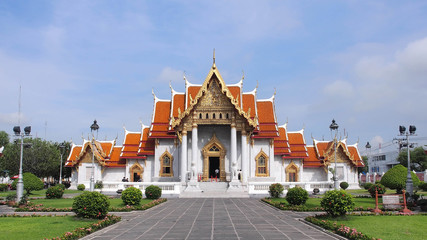 Marble temple under cloudy sky