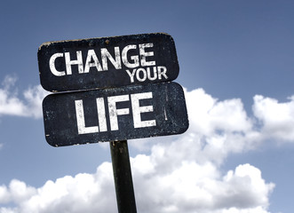 Change your Life sign with clouds and sky background